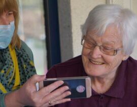 elderly woman with phone