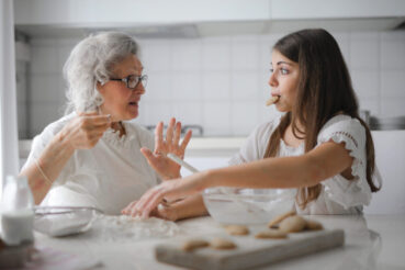 grandma baking with granddaughter